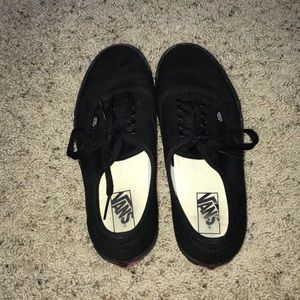 Vans tie-up laced shoes.